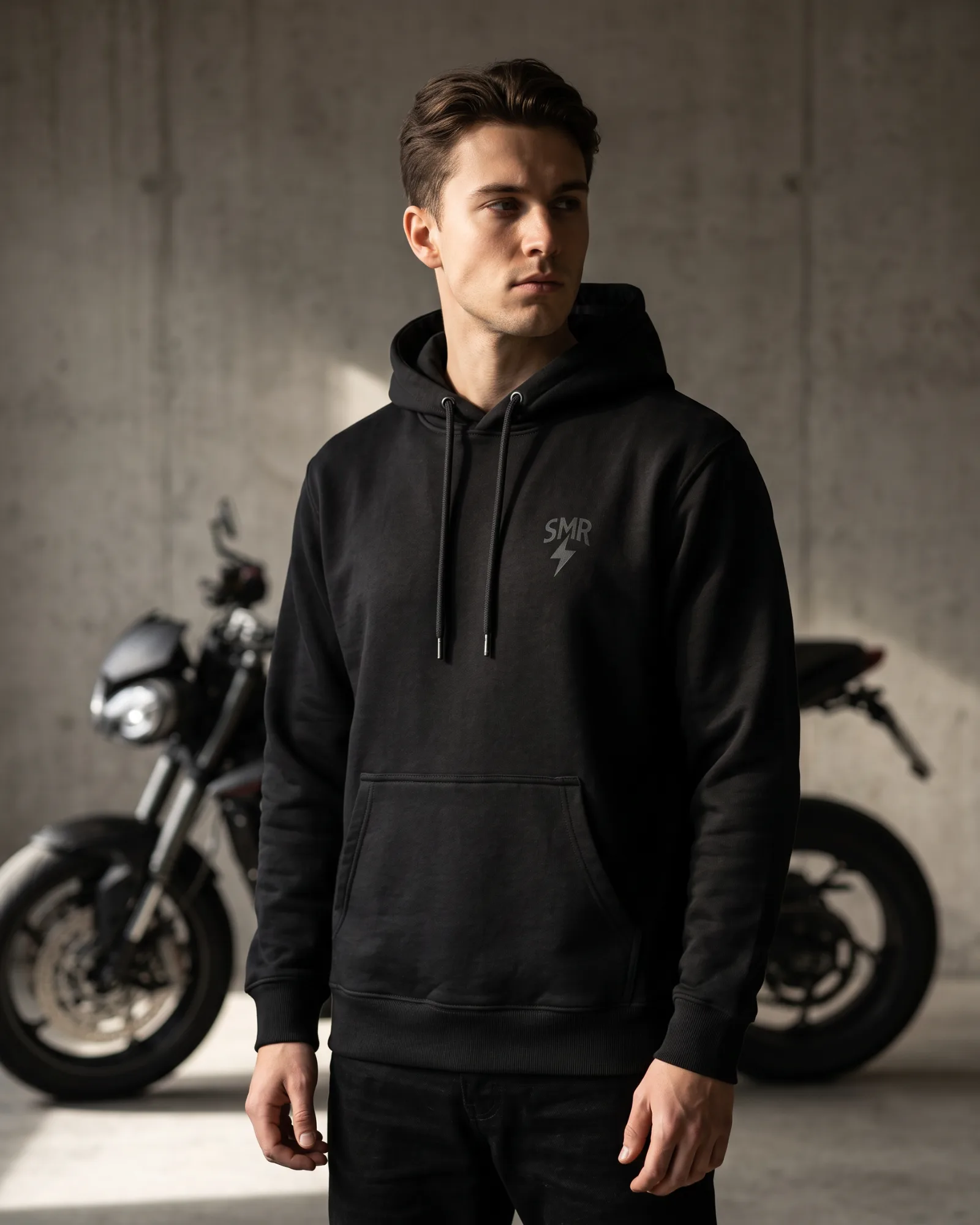 SMR Apex Hood black worn by a model
