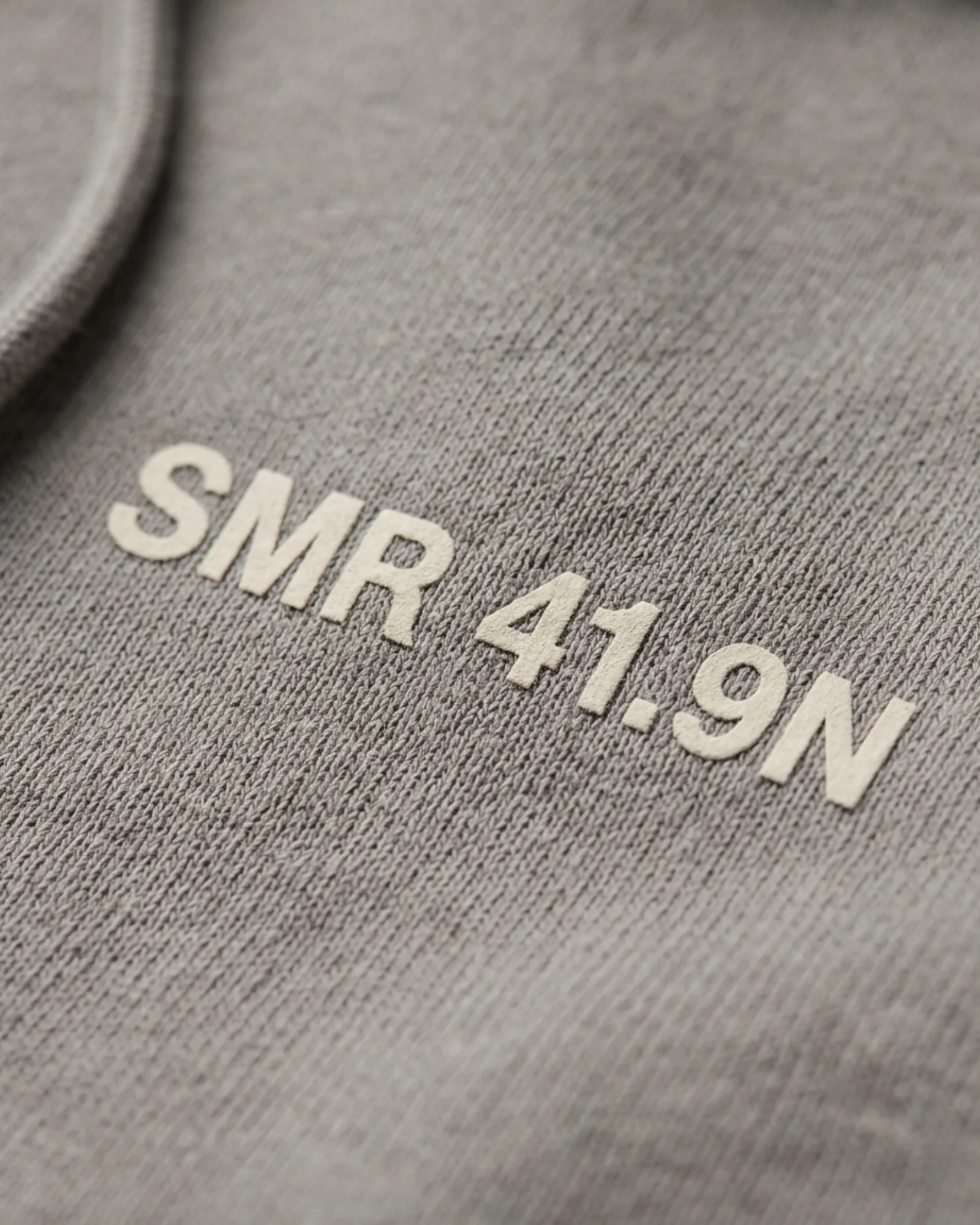 SMR Coordinate Hood concrete print detail