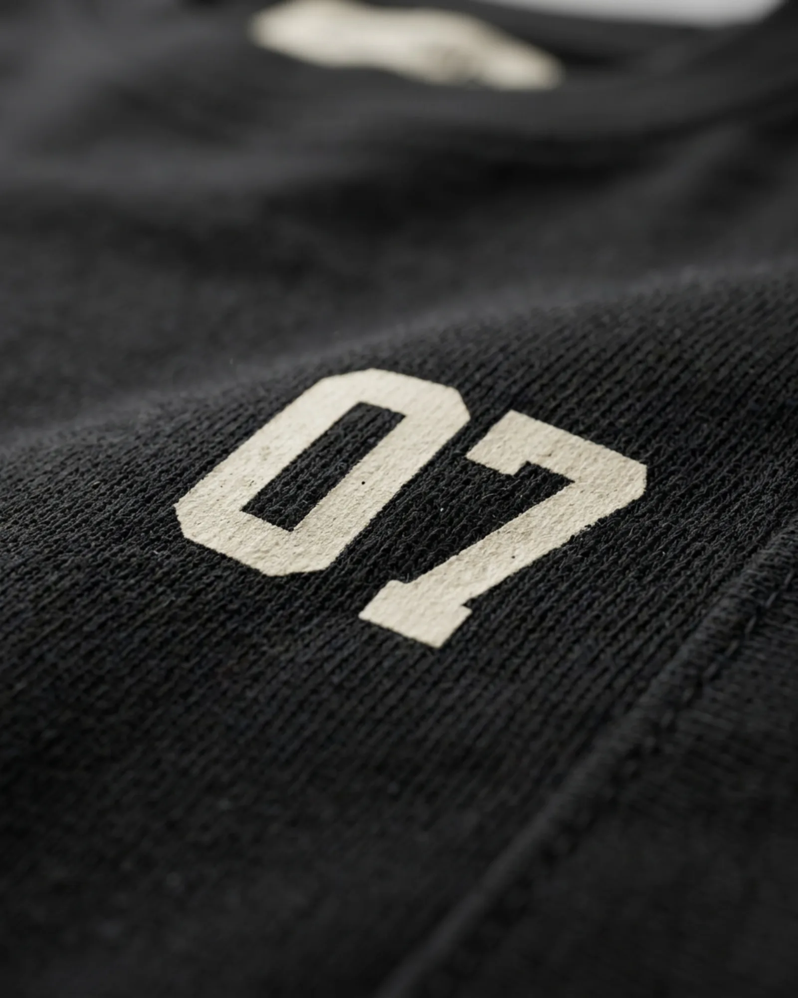 SMR Number 07 Tee black print detail